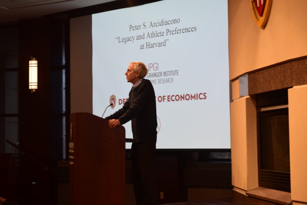 presenter introduces speaker peter arcidiacono who will talk about legacy and athlete preferences at harvard
