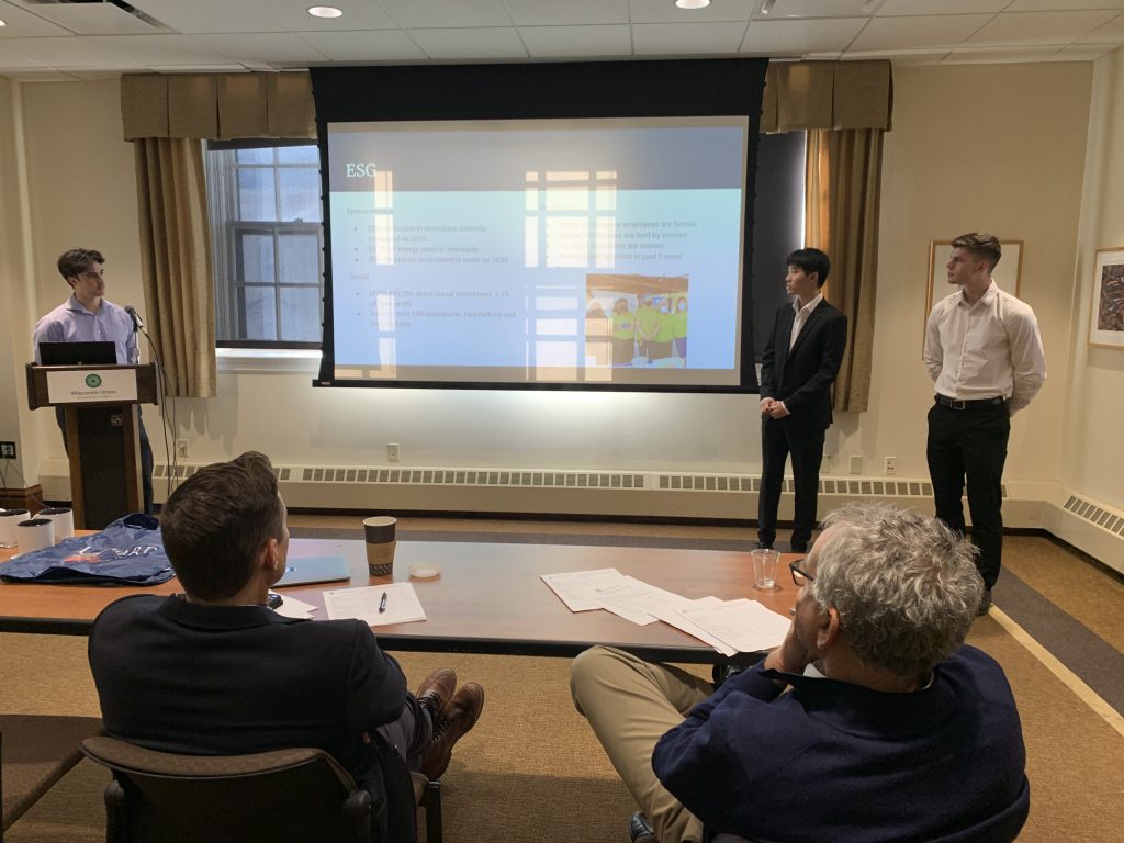 Students present their case to a panel of Economics professors.